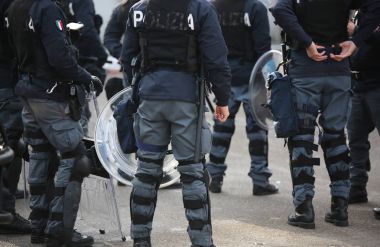 Vicenza, VI, Italy - January 28, 2017: Italian police riot squad with body armor in the city clipart