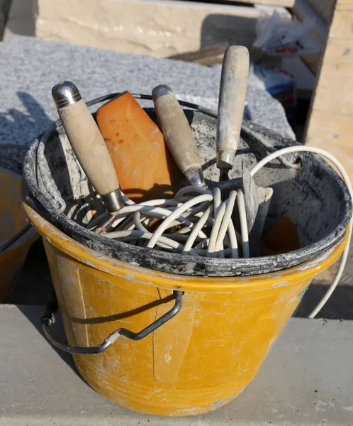 Masonry bucket with tools for house construction — Stock Photo, Image