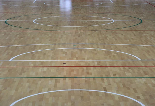 Parquet with the lines of the basketball court and volleyball co — Stock Photo, Image