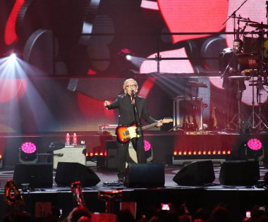 Verona, Italy - October 14, 2017: Live Concert of Umberto Tozzi  clipart