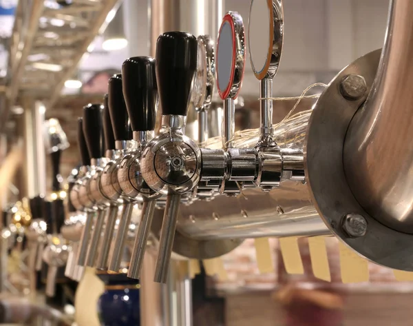 Brewery taps to deliver the beer at the pub — Stock Photo, Image