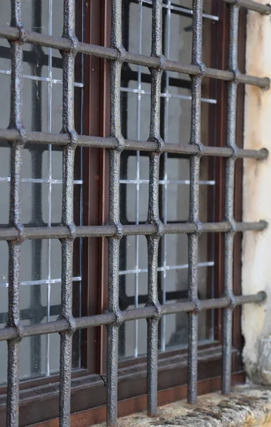 Window with metal grid — Stock Photo, Image