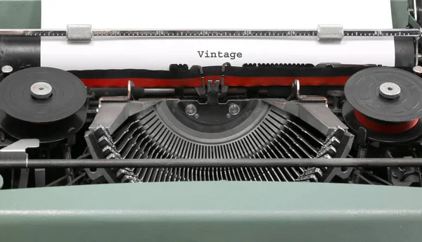 Text VINTAGE written with the old typewriter — Stock Photo, Image