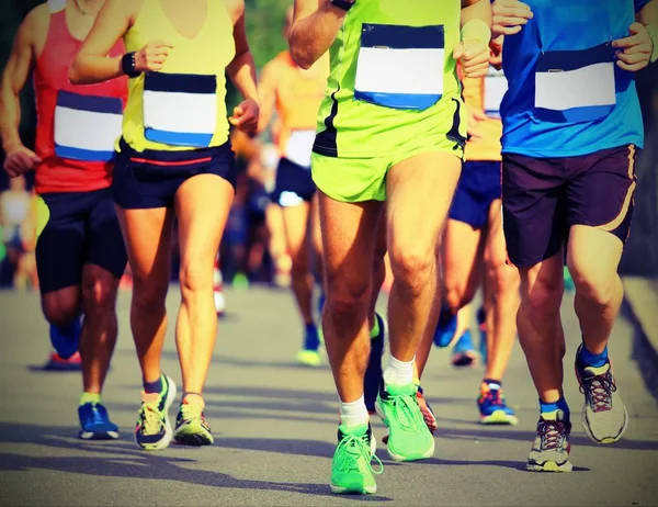 Athletes run fast during the racing race with vintage style effe — Stock Photo, Image