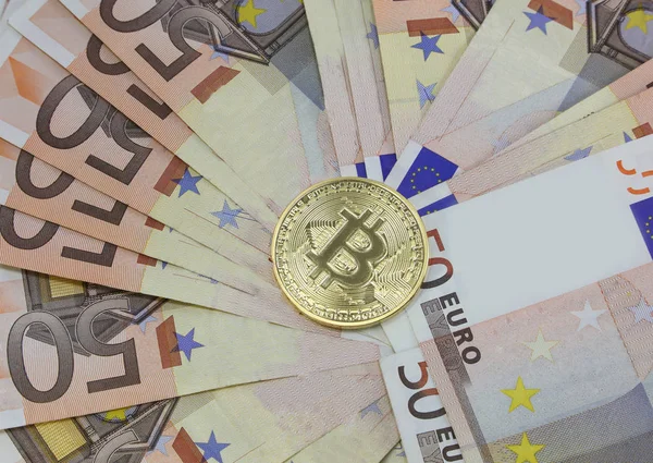 Golden bitcoin with euros — Stock Photo, Image