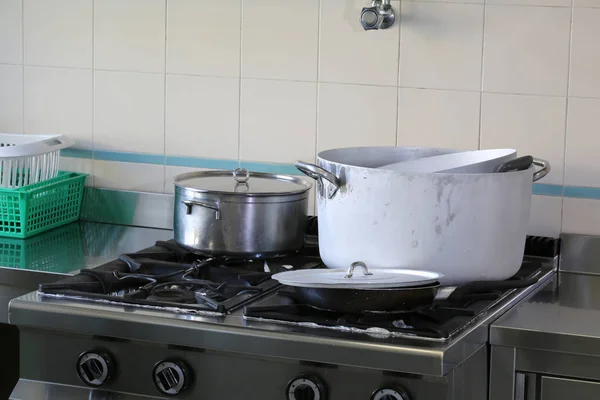 Many pots in the industrial kitchen of caterign — Stock Photo, Image