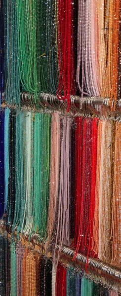 Shelf with many necklaces — Stock Photo, Image