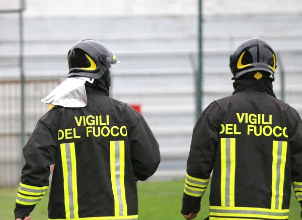 Italian firefighters with uniform with the written FIREFIGHTERS — Stock Photo, Image