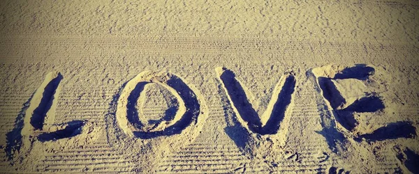 AMORE nella sabbia della spiaggia — Foto Stock