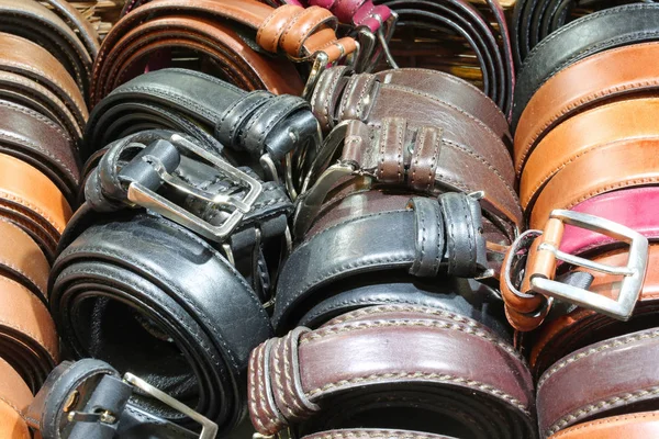 Many belts of leather for sale — Stock Photo, Image