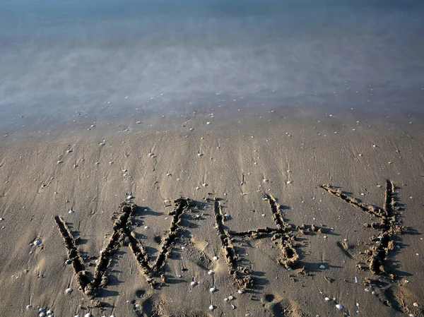 Ogromny tekst Dlaczego na plaży — Zdjęcie stockowe