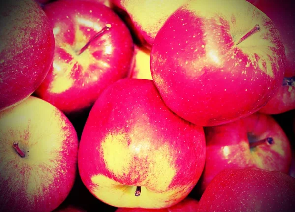 red ripe apples for sale with vintage effect