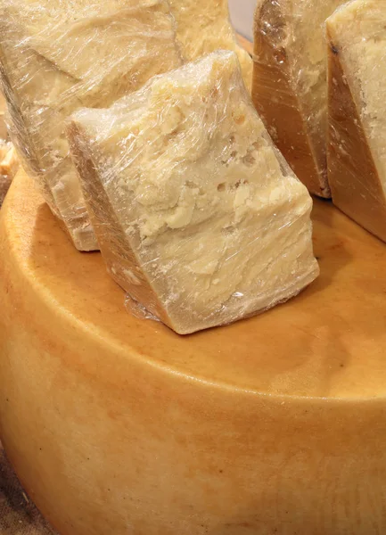 pieces of Cheese Parmesan on sale in the dairy farm