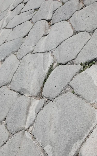 Stones of an ancient roman road — ストック写真