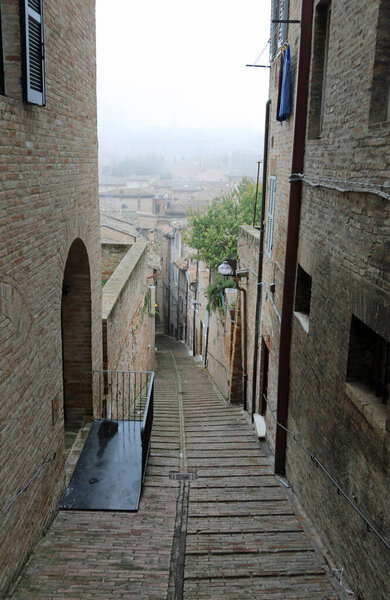 Narrow street of Urbino Town in Central Italy in the Region called Marche