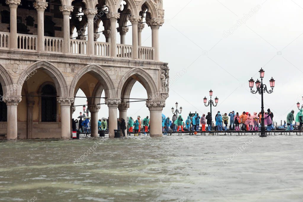 people on the walkway near Ducal Palace in Venice