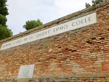 Recanati, MC, Italy - November 2, 19: famous wall of poet Giacom clipart
