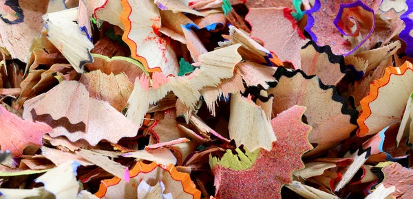 Background of many colored pencils shavings — ストック写真