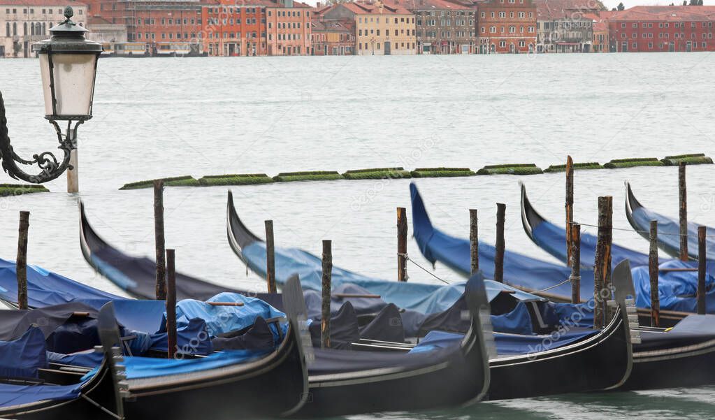 gondolas moored with blur due to the long exposure time during t