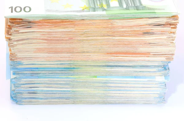 Pile of money in european banknotes on a white background — 스톡 사진