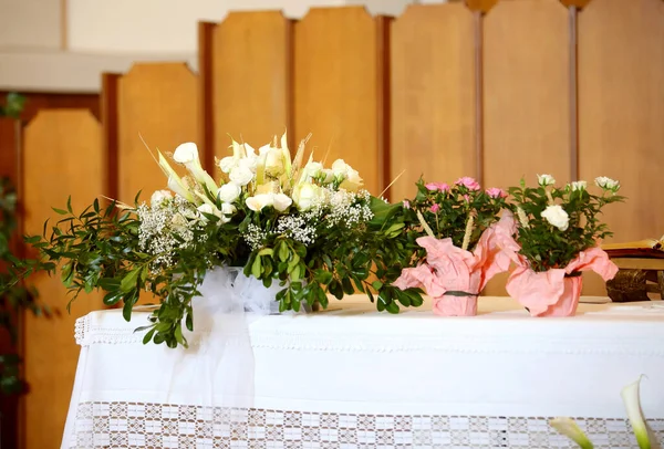 Inside the church and the pots of flowers — Stock Photo, Image