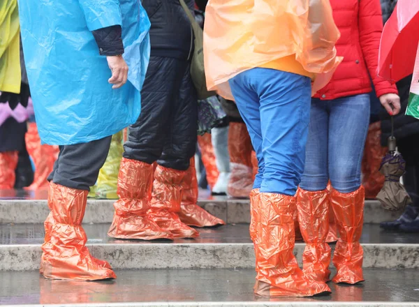 group of people with colored plastics leggings