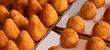 fried stuffed balls of rice called ARANCINO in Italian Language for sale at the street food stall clipart