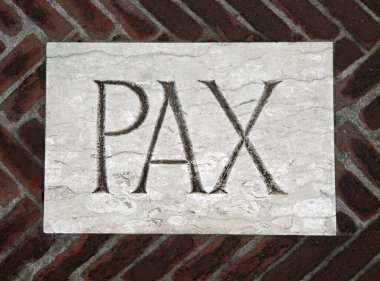 Latince Pax, antik bir kilisenin zemininde barış anlamına gelir.