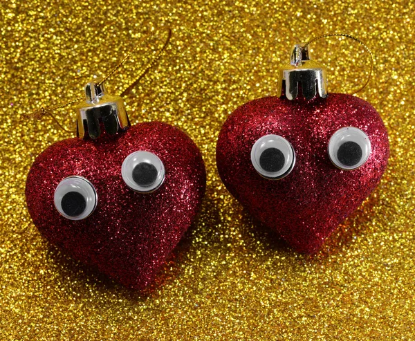 Two Big Cute Red Hearts Eyes Glittery Golden Background — Stock Photo, Image