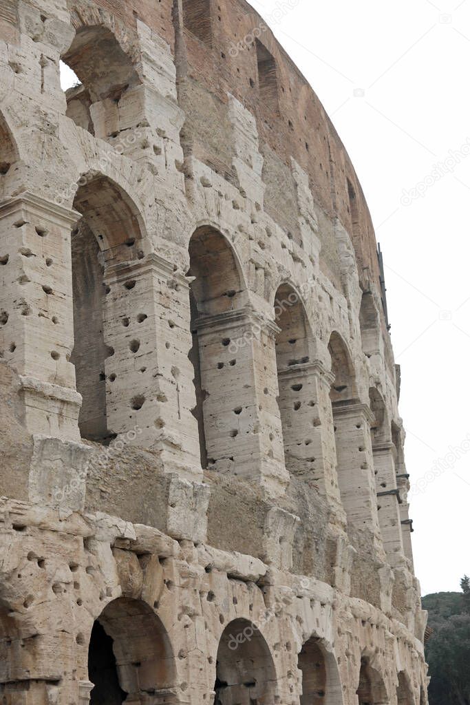 detail of the imposing Colosseum in Rome Capital of Italy and the holes made to recover the iron used during the construction of the monument