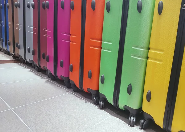 colored  suitcases for sale in the travel accessories store