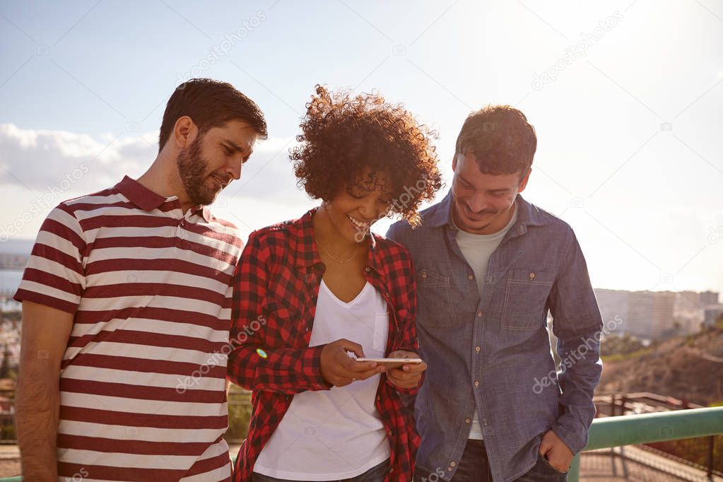 young friends with smartphone