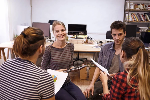 Team of four young businesspeople — Stock Photo, Image