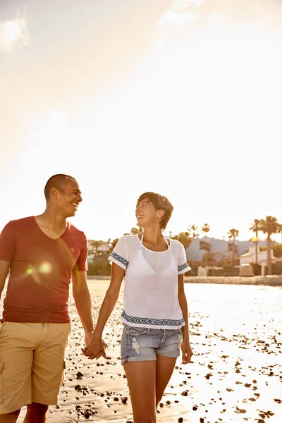 Young couple holding hands together — Stock Photo, Image