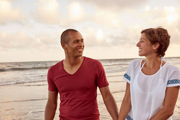Charming couple looking at each other
