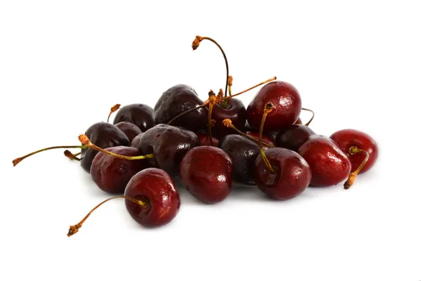 En massa olika sweet cherry på vit bakgrund, — Stockfoto