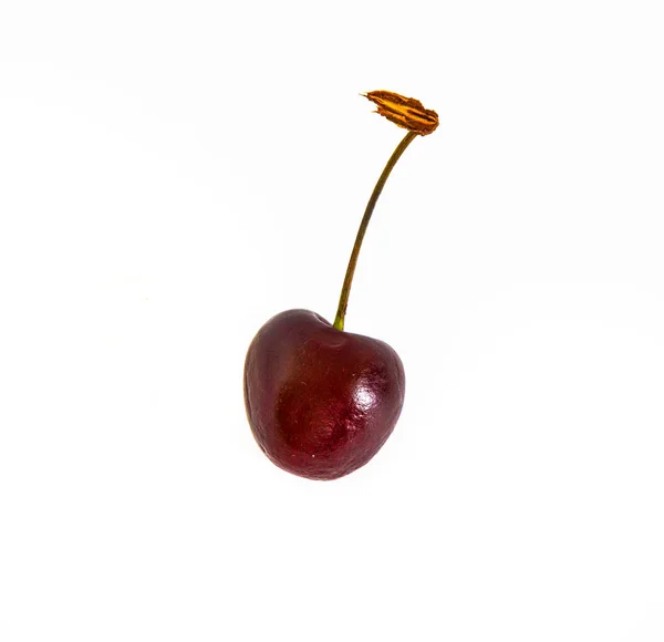 Mnoho různých sweet cherry na bílém pozadí, — Stock fotografie