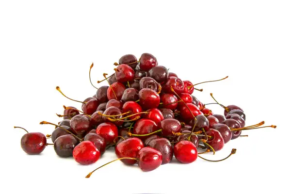 En massa olika sweet cherry på vit bakgrund, — Stockfoto
