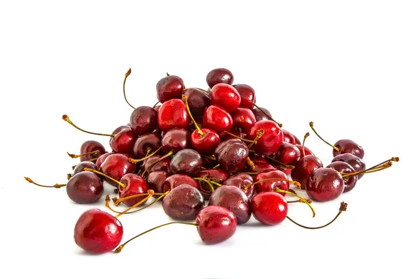 En massa olika sweet cherry på vit bakgrund, — Stockfoto