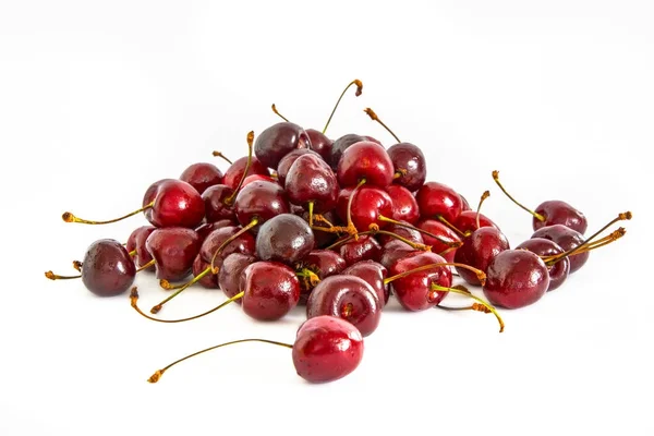 En massa olika sweet cherry på vit bakgrund, — Stockfoto