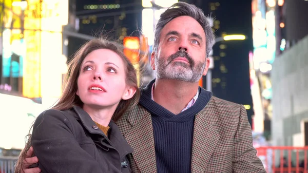 Couple on a date in Times Square NYC