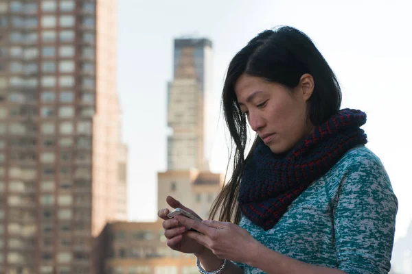 Young Asian woman on Phone