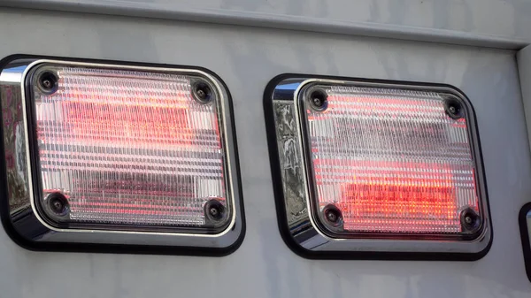 Ambulance red flashing lights still photo warning vehicles on road of emergency medical situation