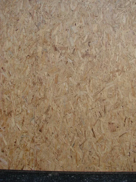 Primer plano de fondo de panel de madera prensada, textura sin costuras de tablero de filamento orientado - OSB madera — Foto de Stock