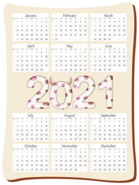 2021 yıllık takvim 12 ay, takvim dikey yönelimli, 2021 'de yılın ineği, boğa sembollü güzel bir yazı var.