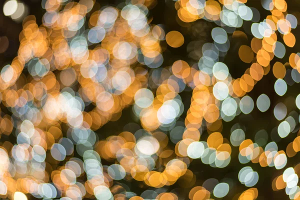 Azul e amarelo abstrato embaçado luz bokeh fundo para sobreposição. Conceito de aniversário e celebração. Festival de ano novo e tema do evento de Natal — Fotografia de Stock
