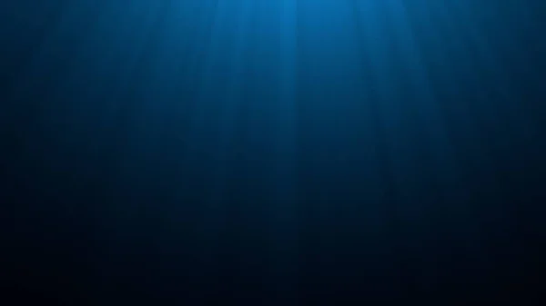 Deep blue undersea with sunlight ray through over surface ripple — Stock fotografie