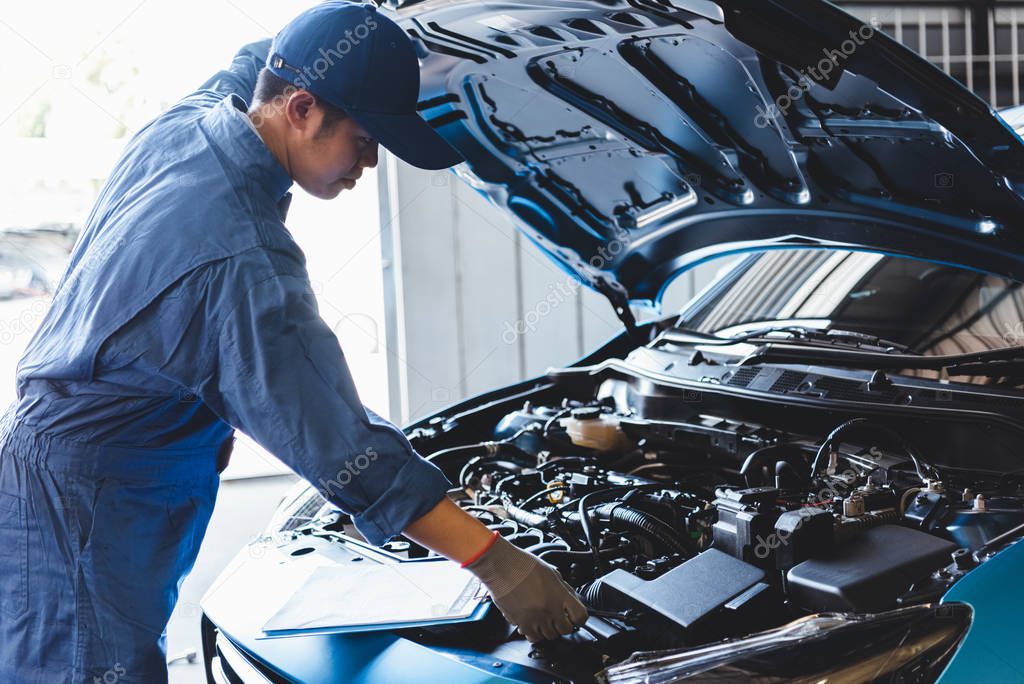 Car mechanic checking to maintenance vehicle by customer claim o