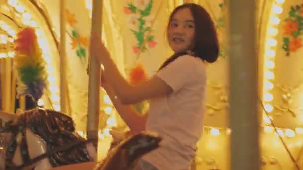 Happy Asian Woman Riding Carousel Horse Amusement Park People Lifestyles — Stock Video