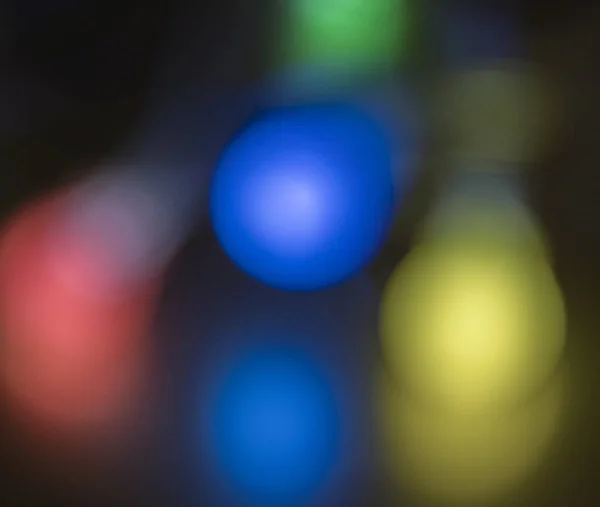 Efecto Bokeh con luces de diferentes colores para gráficos  . — Foto de Stock